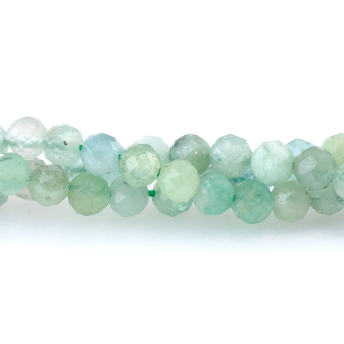 This is a Dakota Stones 3mm Emerald Banded Gemstone strand with faceted round beads in 15-16 inch strand.