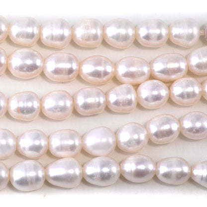 This is a Dakota Stones 10mm Freshwater Pearl White Rice 2mm Gemstone strand of round beads in 8 inch strand.
