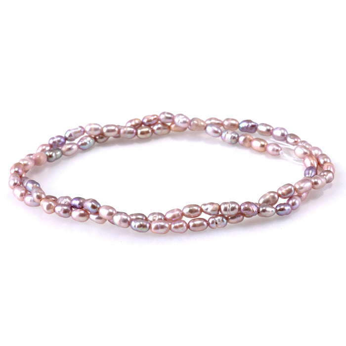 This is a Dakota Stones 3-4mm Freshwater Pearl Pink Rice Gemstone strand of round beads.