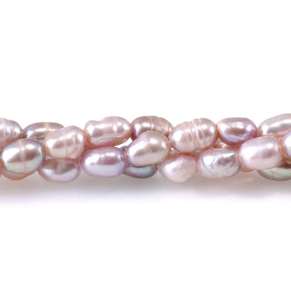 This is a Dakota Stones 3-4mm Freshwater Pearl Pink Rice Gemstone strand of round beads.