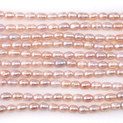 This is a Dakota Stones 4-5mm Freshwater Pearl Light Pink Rice Gemstone strand of round beads.
