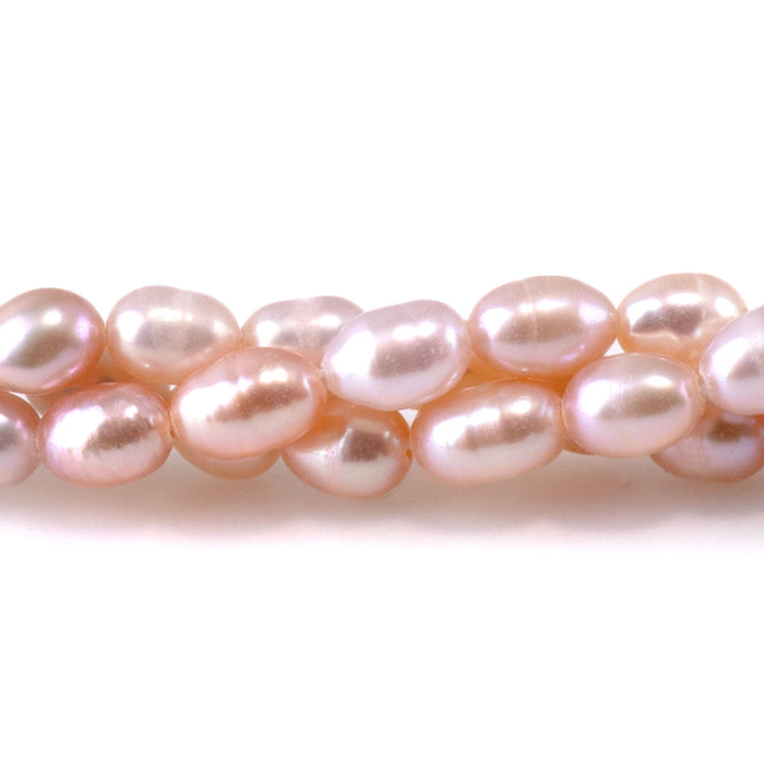 This is a Dakota Stones 4-5mm Freshwater Pearl Light Pink Rice Gemstone strand of round beads.