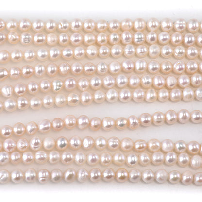 This is a Dakota Stones 4-5mm Freshwater Pearl White Potato Gemstone strand of round beads.