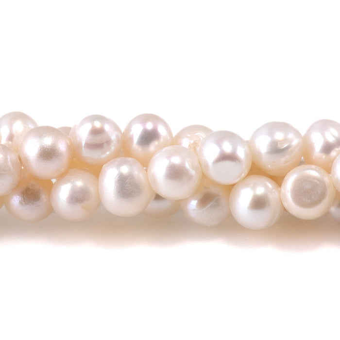 This is a Dakota Stones 4-5mm Freshwater Pearl White Potato Gemstone strand of round beads.