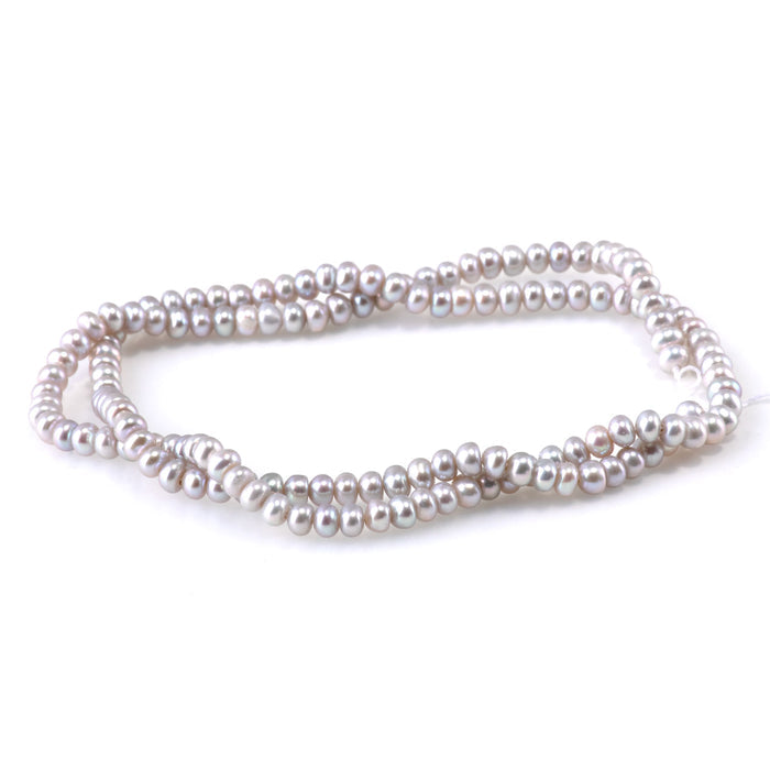 This is a Dakota Stones 4mm Freshwater Pearl Silver Gemstone strand with rondelle beads.