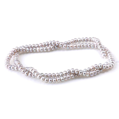 This is a Dakota Stones 4mm Freshwater Pearl Silver Gemstone strand with rondelle beads.