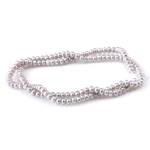 This is a Dakota Stones 4mm Freshwater Pearl Silver Gemstone strand with rondelle beads.