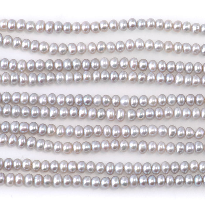 This is a Dakota Stones 4mm Freshwater Pearl Silver Gemstone strand with rondelle beads.