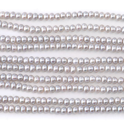This is a Dakota Stones 4mm Freshwater Pearl Silver Gemstone strand with rondelle beads.