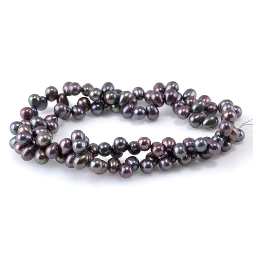 This is a Dakota Stones 5mm Freshwater Pearl Peacock Rice Gemstone strand of round beads.