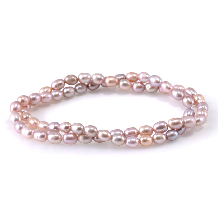 This is a Dakota Stones 5mm Freshwater Pearl Pink Rice Gemstone strand of round beads.