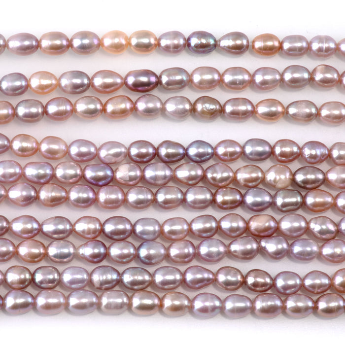 This is a Dakota Stones 5mm Freshwater Pearl Pink Rice Gemstone strand of round beads.