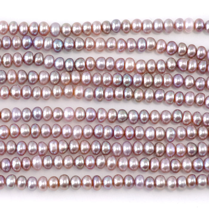 This is a Dakota Stones 5mm Freshwater Pearl Pink Gemstone strand with rondelle beads.