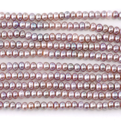 This is a Dakota Stones 5mm Freshwater Pearl Pink Gemstone strand with rondelle beads.
