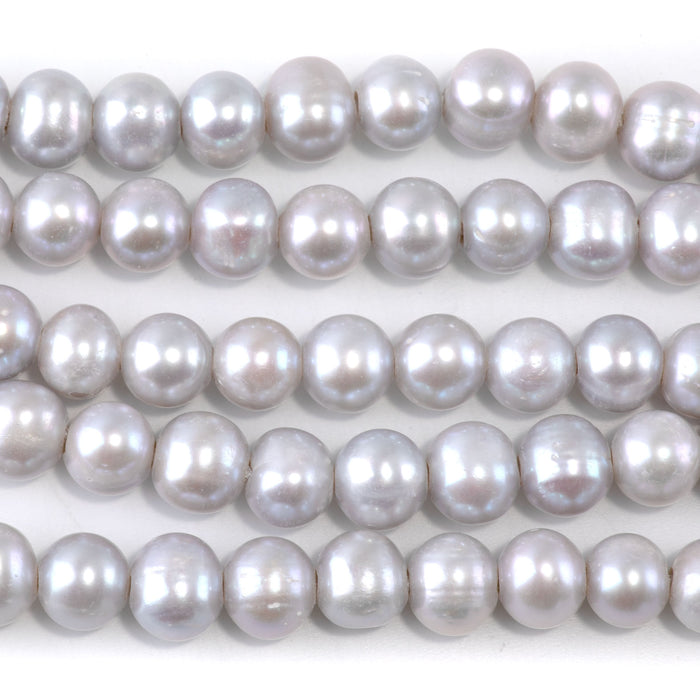 This is a Dakota Stones 9-10mm Freshwater Pearl Silver Potato 2mm Gemstone strand of round beads in 8 inch strand.