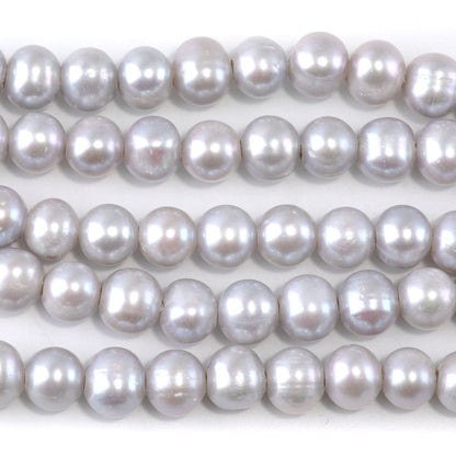 This is a Dakota Stones 9-10mm Freshwater Pearl Silver Potato 2mm Gemstone strand of round beads in 8 inch strand.