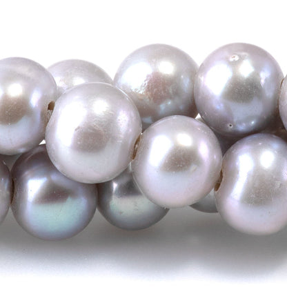 This is a Dakota Stones 9-10mm Freshwater Pearl Silver Potato 2mm Gemstone strand of round beads in 8 inch strand.