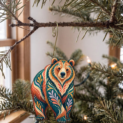 Laser-cut maple wood Grizzly Bear folk art ornament O247 hanging on a fir branch, made in USA