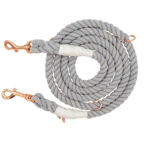 The Sassy Woof Hands-Free Rope Leash - Serenity is a coiled, light gray, hand-crafted leash featuring rose gold metal clips at both ends and white binding accents near the ends, displayed on a white background.