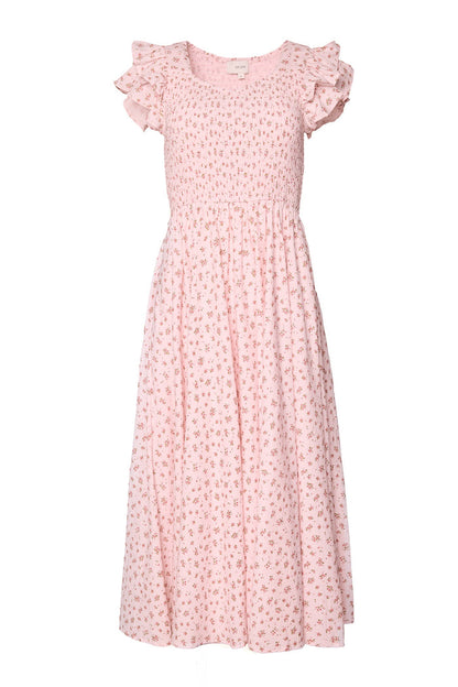 The Hattie Dress in Madeline Pink by Ivy City Co is a light pink midi cotton dress with short sleeves, ruffled shoulder detail, floral print, a fitted smocked bodice, and flowy gathered skirt—ideal as a birthday girl dress.