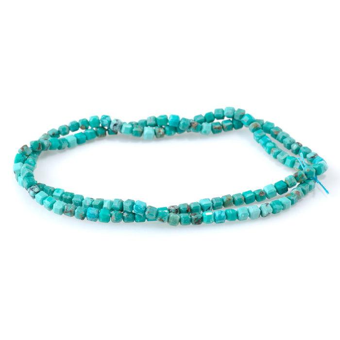 This is a Dakota Stones 3mm Hubei Turquoise Green Gemstone strand with table-cut cube beads in 15-16 inch strand.