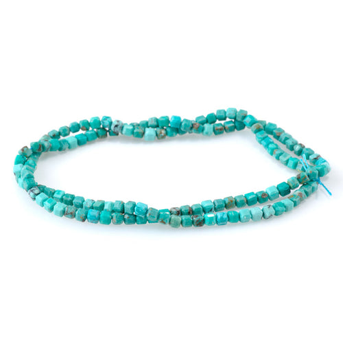 This is a Dakota Stones 3mm Hubei Turquoise Green Gemstone strand with table-cut cube beads in 15-16 inch strand.