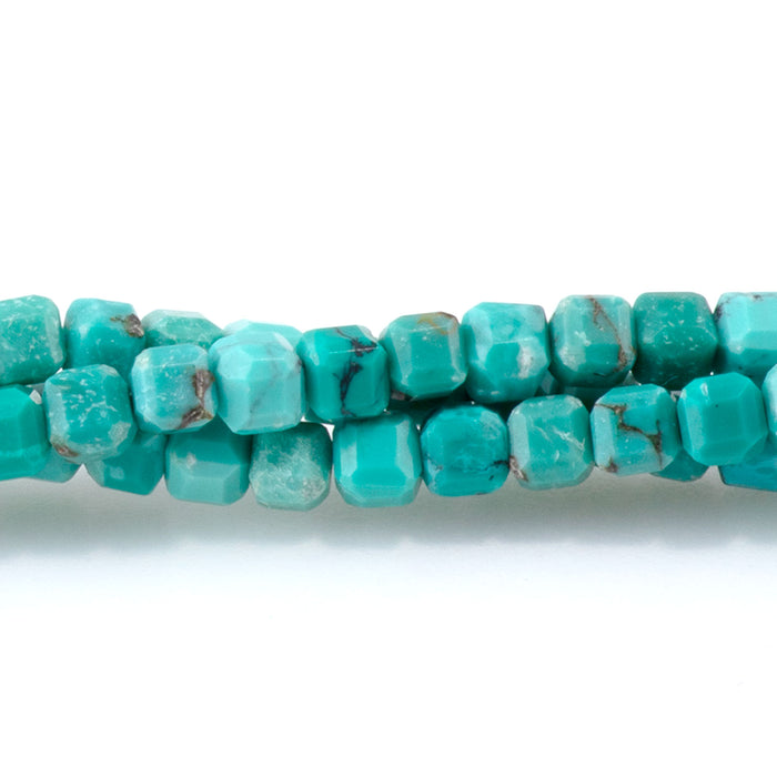 This is a Dakota Stones 3mm Hubei Turquoise Green Gemstone strand with table-cut cube beads in 15-16 inch strand.