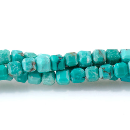 This is a Dakota Stones 3mm Hubei Turquoise Green Gemstone strand with table-cut cube beads in 15-16 inch strand.