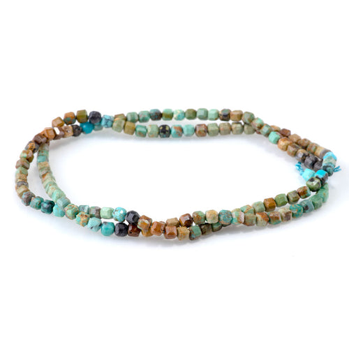 This is a Dakota Stones 3mm Hubei Turquoise Banded Gemstone strand with table-cut cube beads in 15-16 inch strand.