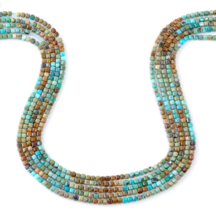 This is a Dakota Stones 3mm Hubei Turquoise Banded Gemstone strand with table-cut cube beads in 15-16 inch strand.