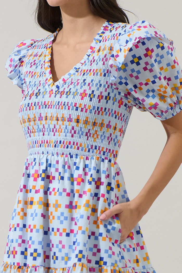 Kessa Geo Leones Smocked Mini Dress