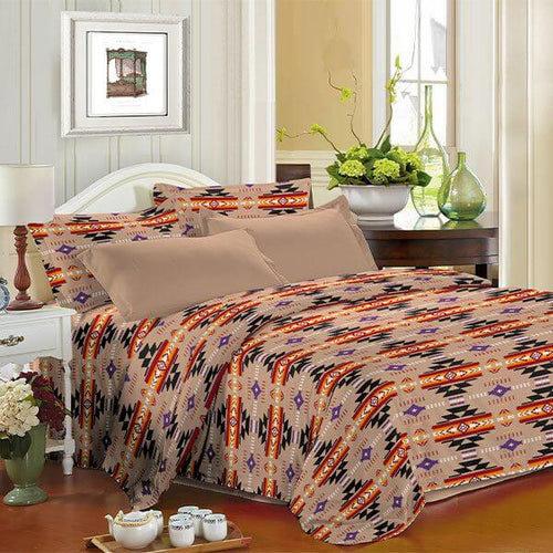 King 4pc Sheet Set – Sandstone displayed on a bed, featuring Navajo print design and beige pillow cases.