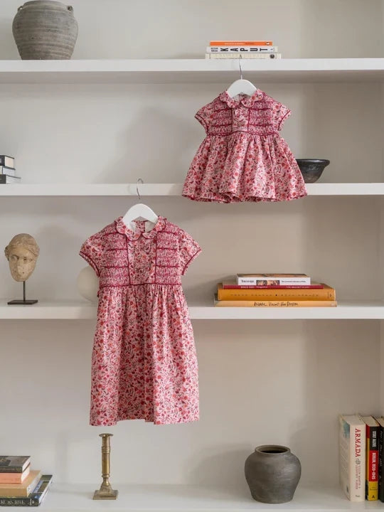 La Coqueta Scarlett Hand Smocked Fish in Pink Bird Floral