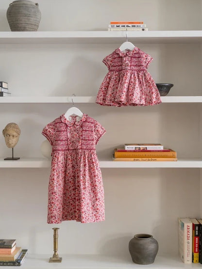 La Coqueta Scarlett Hand Smocked Fish in Pink Bird Floral