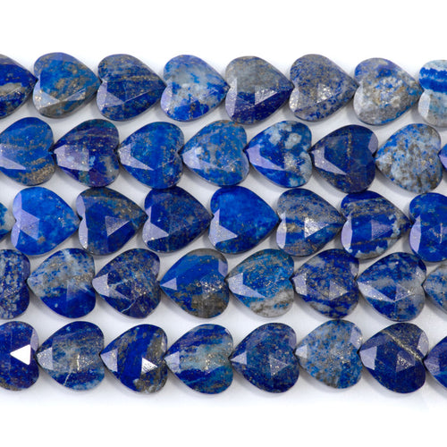 This is a Dakota Stones 14mm Lapis Gemstone strand with faceted heart beads in 15-16 inch strand.