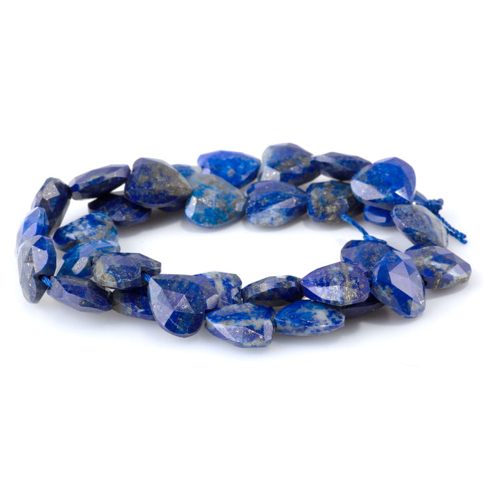 This is a Dakota Stones 14mm Lapis Gemstone strand with faceted heart beads in 15-16 inch strand.