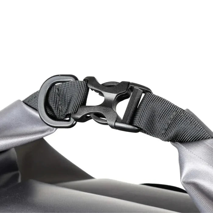Close-up of a Lifeventure Heavy Duty Dry Bag Backpackd roll-top clip closure on a white background