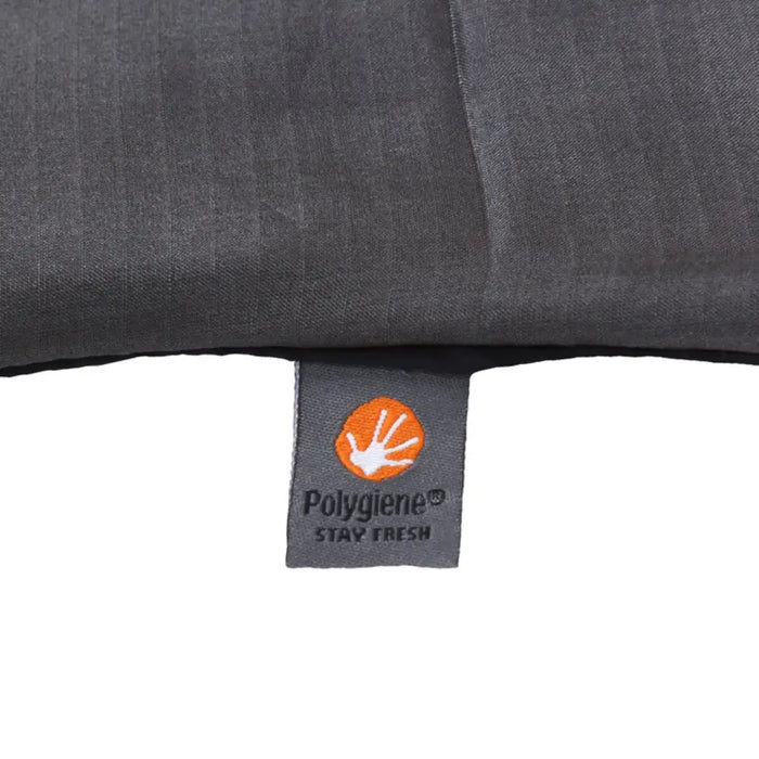 Polygiene hygiene tab on the side seam of a Lifeventure silk blend sleeping bag liner on a white background