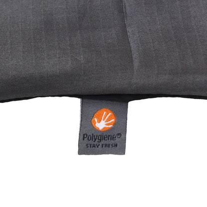 Polygiene hygiene tab on the side seam of a Lifeventure silk blend sleeping bag liner on a white background