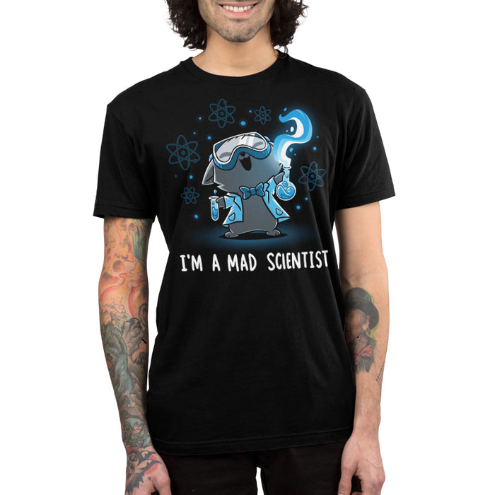 Premium Cotton T-shirt_TeeTurtle Mad Scientist black t-shirt featuring an illustration of a cartoon gray cat smiling evilly wearing safety goggles, a lab coat and a bowtie holding chemistry apparatus surrounded by floating orbs. "I'M A MAD SCIENTIST" is written underneath.