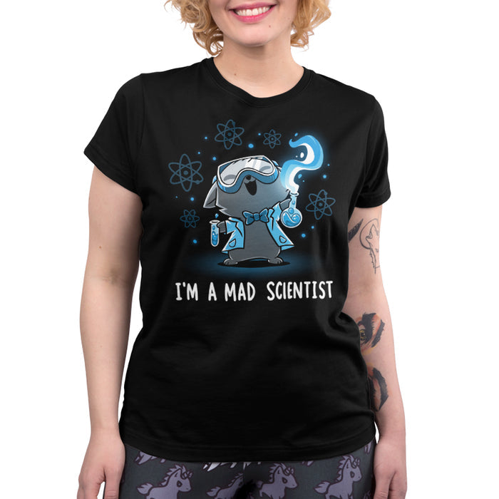 Premium Cotton T-shirt_TeeTurtle Mad Scientist black t-shirt featuring an illustration of a cartoon gray cat smiling evilly wearing safety goggles, a lab coat and a bowtie holding chemistry apparatus surrounded by floating orbs. "I'M A MAD SCIENTIST" is written underneath.