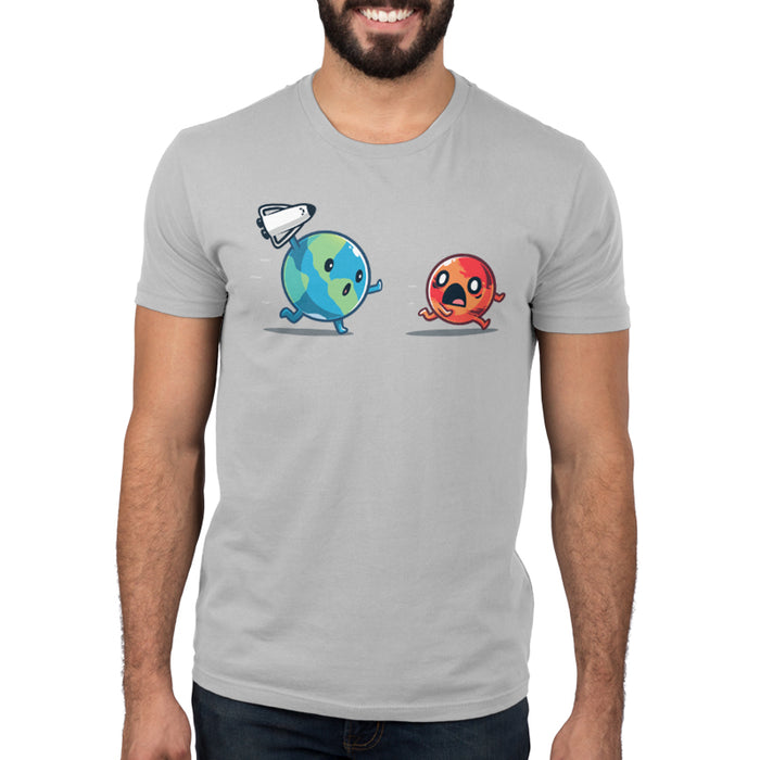 Premium Cotton T-shirt_TeeTurtle Mars Invasion silver gray t-shirt featuring an animated planet Earth holding a toy spaceship chasing an animated planet Mars planet who screams in space.
