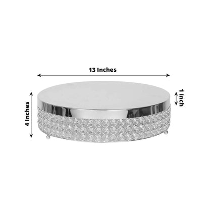 Crystal cake stand, 13 inches wide, 1 inch high, elegant design.