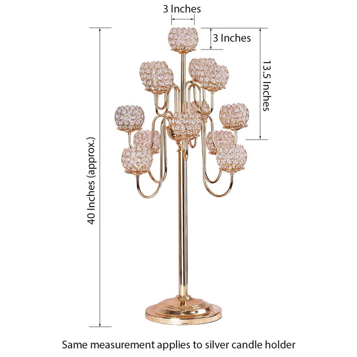 Gold candelabra with crystal accents, 40 inches tall.