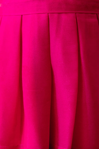 close up fabric shot of a pink dress