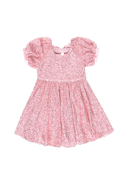 Pink sequin dress against a white background
