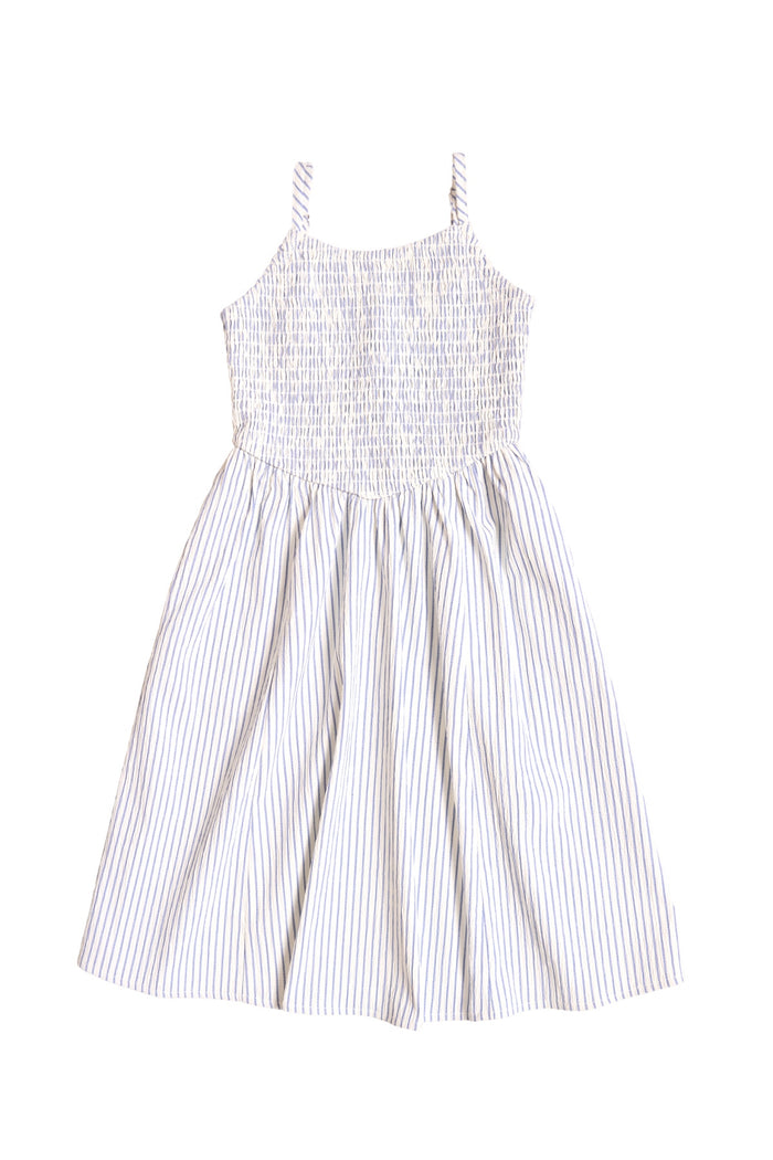 The Mini Maxwell Dress in Blue & White Pinstripe by Ivy City Co features thin straps, a smocked bodice, flared skirt, and vertical blue pinstripes. Perfect for sunny days and available in Mom and Me matching styles. Shown on a plain white background.