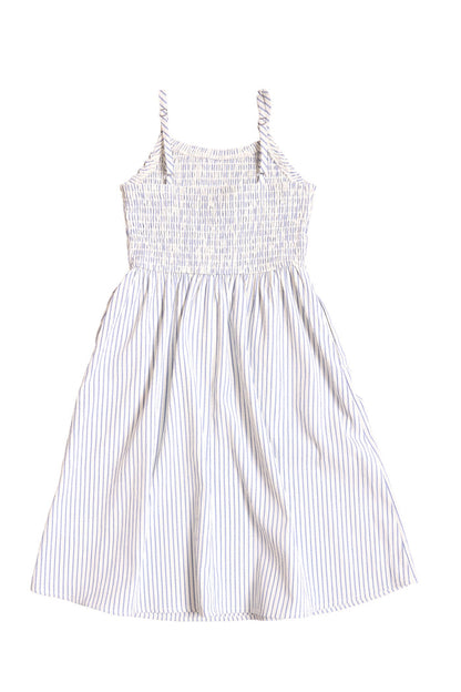 The Mini Maxwell Dress in Blue & White Pinstripe by Ivy City Co features a white sleeveless design with thin straps, light blue vertical stripes, a smocked bodice, and a flowing knee-length skirt—ideal for matching Mom and Me outfits.