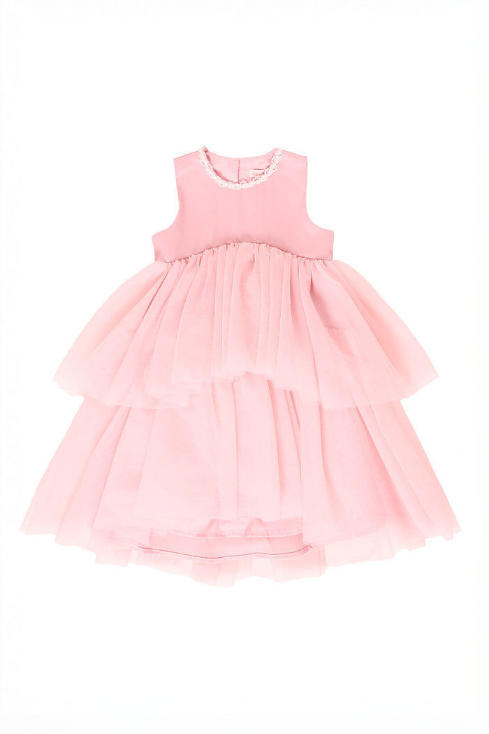 Pink tiered dress on a white background