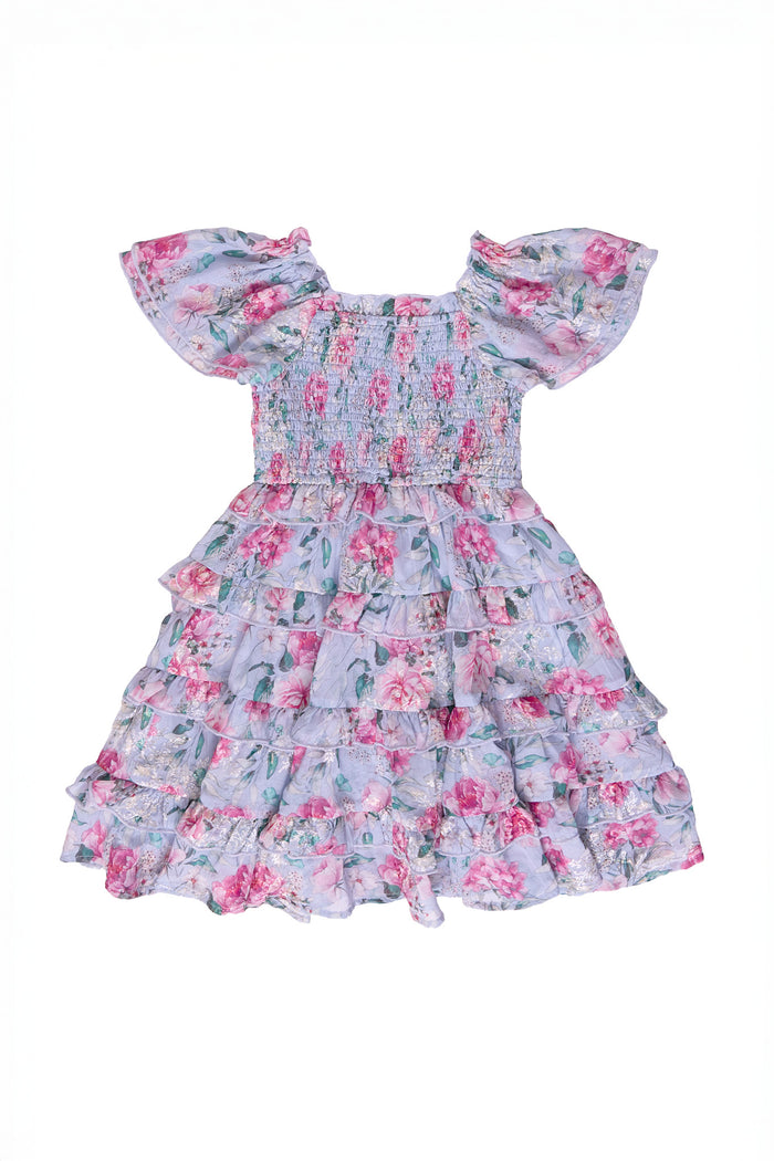 purple floral dress against a white backdrop